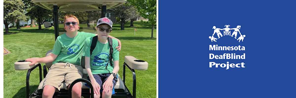 An adolescent boy with red hair and blue sunglasses and a young adult man wearing a baseball cap, sunglasses and a backpack sit on the back of a golf cart.